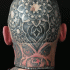Stippling style black ink head tattoo of incredible flowers
