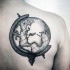 Stippling style black ink scapular tattoo of big globe