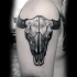 Stippling style black ink shoulder tattoo of goat skull