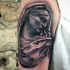 Stonework style 3D like shoulder tattoo of stone statue