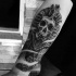 Stonework style black ink forearm tattoo of Pharaoh skeleton statue