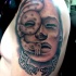 Stonework style colored shoulder tattoo of antic statue