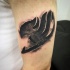 Stonework style detailed shoulder tattoo of mystical symbol