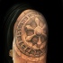 Stonework style detailed shoulder tattoo of big sculpture