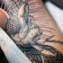Stonework style detailed tattoo of Icarus statue