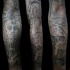 Stonework style large sleeve tattoo of Egypt statues and symbols