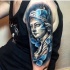 Stonework style shoulder tattoo of antic statue