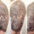 Stonework style very detailed shoulder tattoo of ancient statue