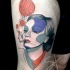 Strange designed and colored smoking woman portrait tattoo on thigh