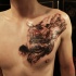 Strange looking colored chest tattoo of flying fantasy creature
