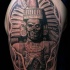 Stunning black and white shoulder tattoo of antic stone statue