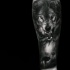 Tatuaje en el antebrazo, lobo fascinante realista con su familia