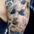 Stunning looking black ink half sleeve tattoo of creepy woman face with smoke