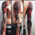 Stunning looking colored sleeve tattoo of various ornaments
