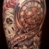 Stunning multicolored shoulder tattoo of old clock with flowers and lettering