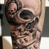 Superior black and white leg realism style leg tattoo of demonic human skull with headset