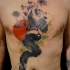 Surrealism style black ink chest tattoo of mans hand with flowers and moon