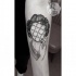 Surrealism style black ink forearm tattoo of faceless woman