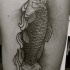 Surrealism style black ink tattoo of big fish with hand