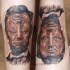 Surrealism style colored interesting looking Lincoln portrait tattoo on leg