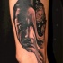 Surrealism style colored man face tattoo stylized with deep space