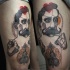 Surrealism style colored man with human brains tattoo on thigh