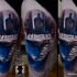 Surrealism style colored thigh tattoo of mystical face with human shaped figure