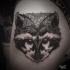 Tatuaje en el muslo, 
cara simple  de mapache