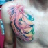 Tatuaje en el pecho,  león hermoso multicolor