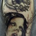 Tatuaggio spaventoso sul braccio la ragazza & l'occhio