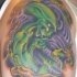 aliene verde e xenomorph bambino colorato tatuaggio