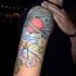 Universo colorato sul deltoide
tatuaggio