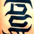 Un piccolo tatuaggio di disegno calligrafico