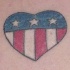 Bandiera americana in cuore tatuaggio