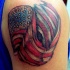 Bandiera americana colorata tatuaggio