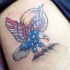 Sole e bandiera americana sul aquila tatuaggio