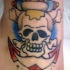 Tatuaje de color Cráneo y huesos en la ancla