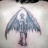 Tatuaje en la espalda Mujer ángel con grandes alas