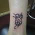 Tatouage sur la cheville de licorne