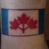 Premier drapeau canadien le tatouage sur la cheville