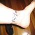 Tatouage sur la cheville de gens dansants