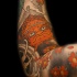 Tattoo von Mann mit Bart am Arm