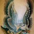 Un aigle le tatouage sur le bras