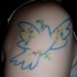 Tatouage sur le bras de pigeon