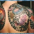 Tatuaggio in stile Yakuza con carpa giapponese