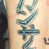 Geroglifico asiato colorato tatuato