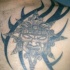 Tatuaje de una deidad demoníaca azteca.