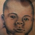 Tatuaje retrato de un niño lindo
