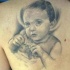 Tatuaje retrato de niño pequeño