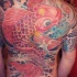 Grande carpa giapponese colorata tatuata